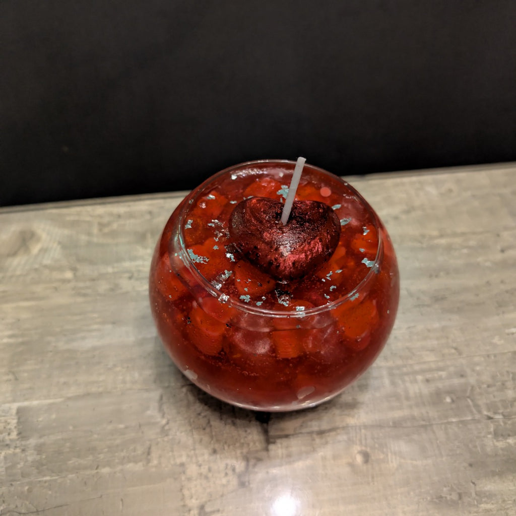 Edle Herzkerze im Kugelglas